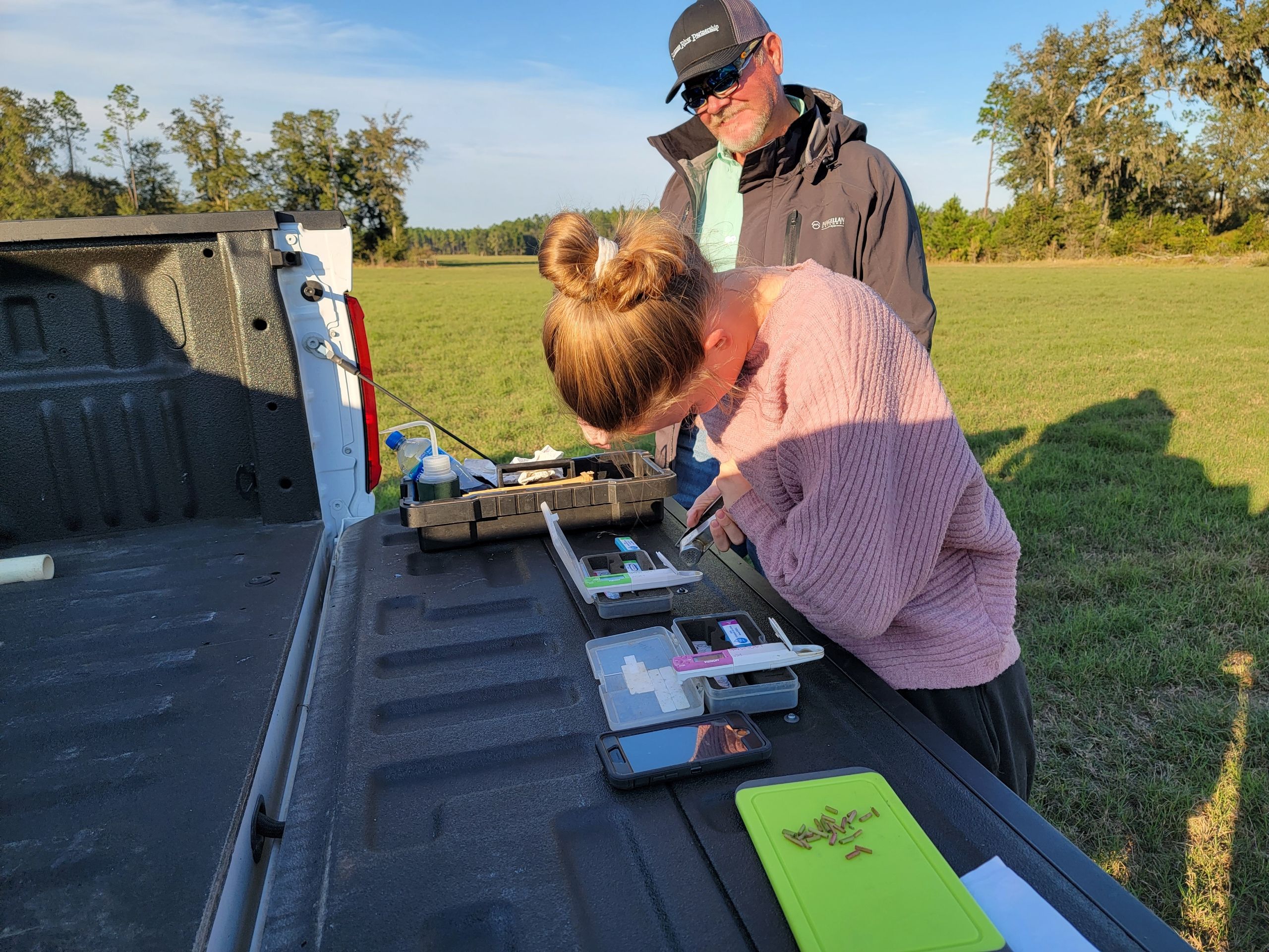 FLVS student Reagan working on a fruit production Supervised Agricultural Experience (SAE).