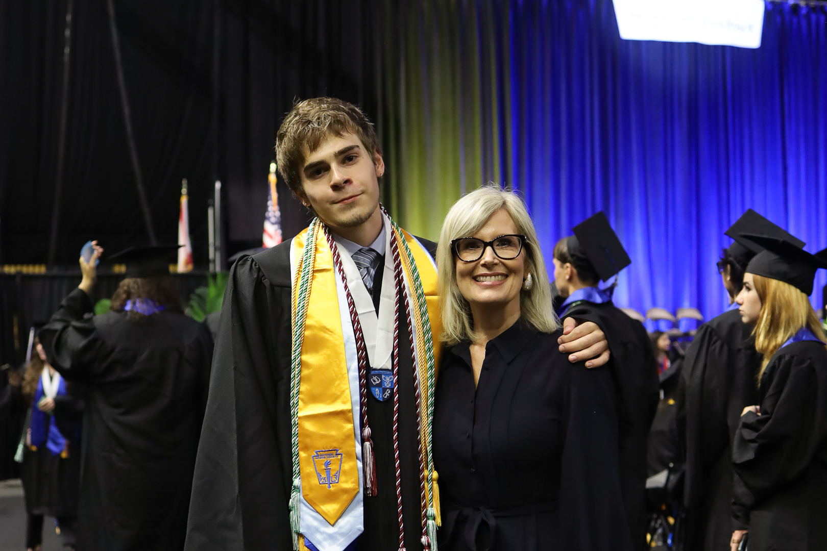 SeniorFelixWaltherleftwithPrincipalSuzannaPachecoWaltherwhoisfromCapeCoralwasoneoftheClassof2025sTopScholarHereceivedtheCambridgeAdvancedInternationalCertificateofEducationAICEDiplomawithDistinction