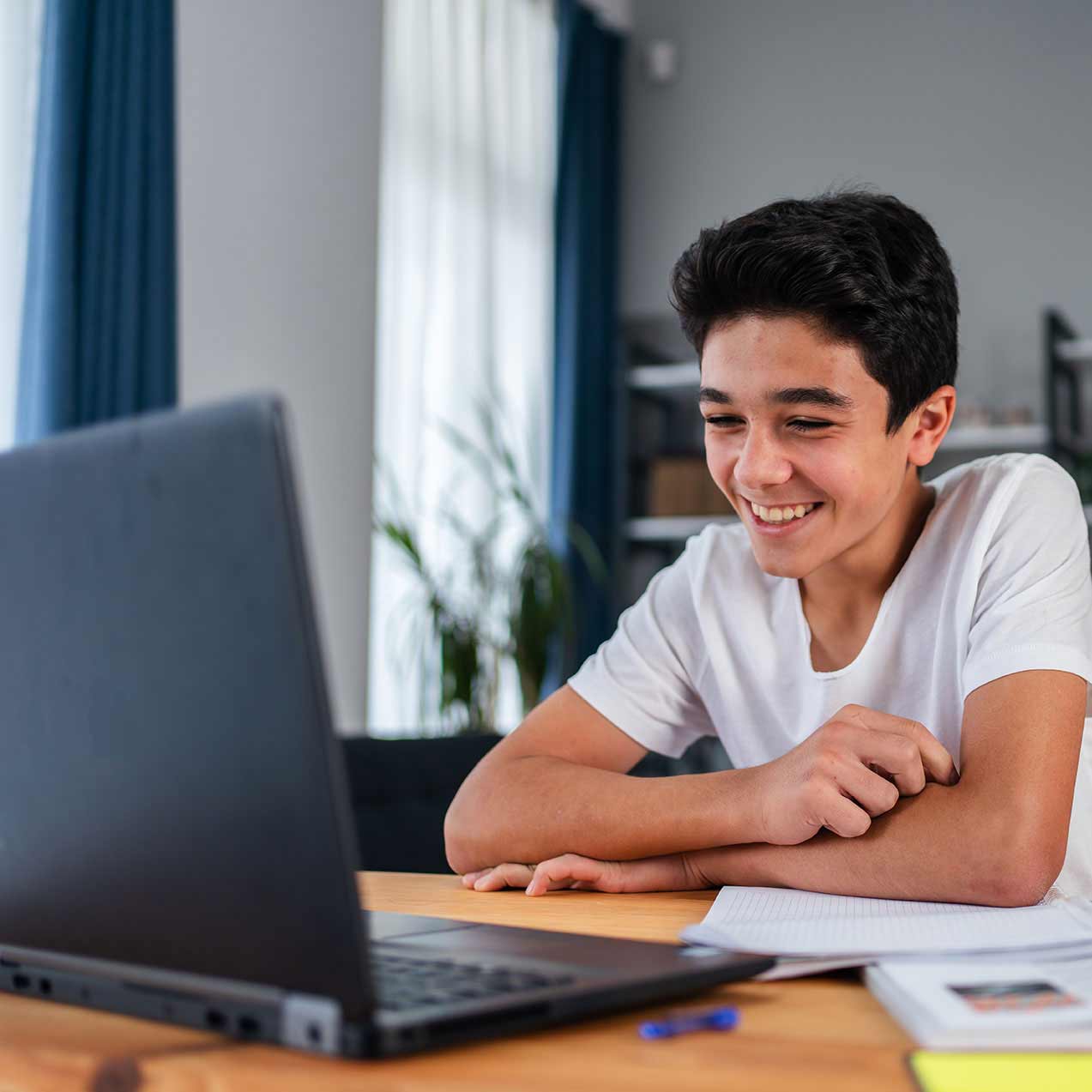 Student completing work on computer
